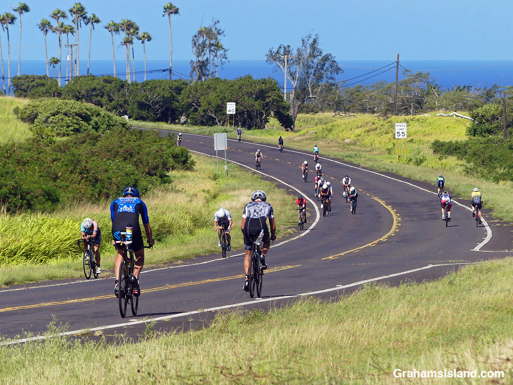 Cyclists in the 2026 Ironman 70.3 race in Hawaii, heading to and from Hawi.