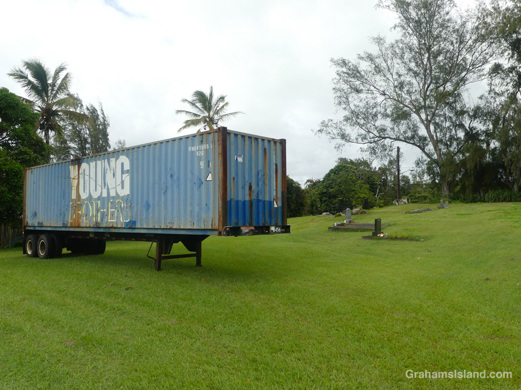 A trailer parked in a graveyard in Hawaii