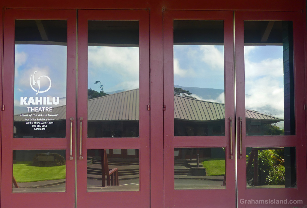 Reflection in the windows of Kahilu Theatre in Kamuela, Hawaii