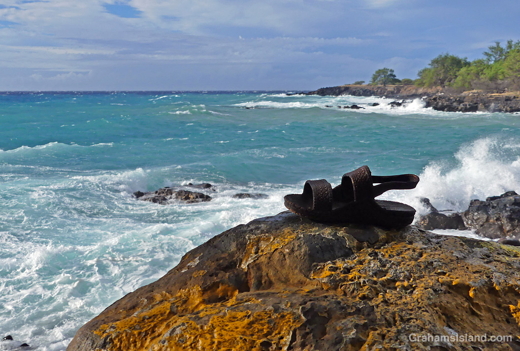 A slippah on a rock at Mahukona, Hawaii